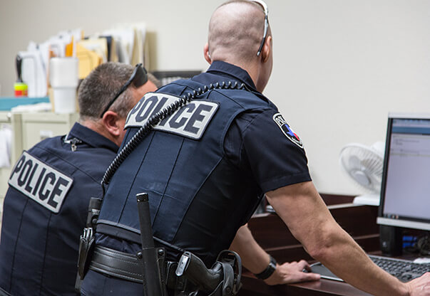 Corrections officers screening mail