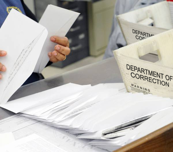 Mail screening in corrections facility