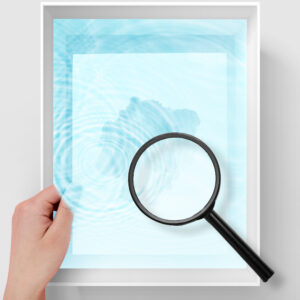 Magnifying glass over paper